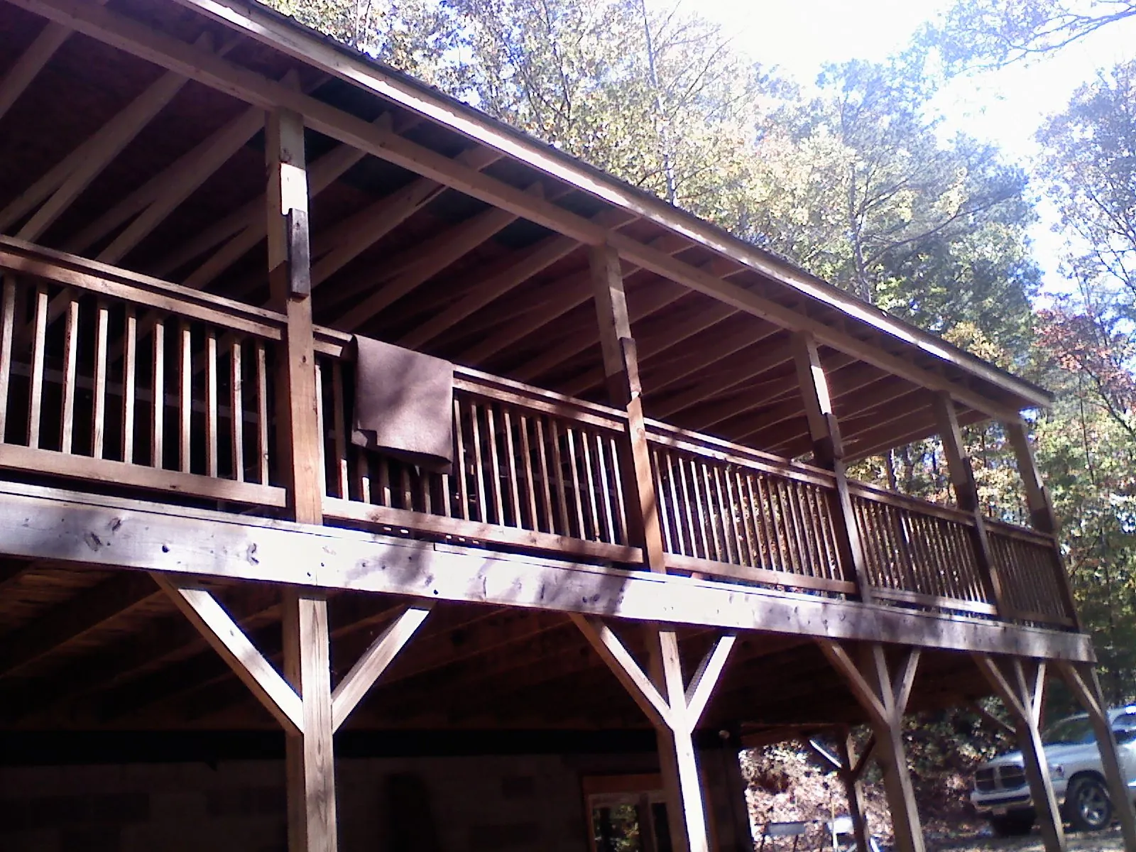 Timber framing under a new elevated porch and deck — Roof Leak Repair in Merrimac by Roofing Brothers